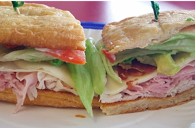 The Lunchbox signature dishes Turkey Club
Chicken Salad Sandwich
Garden Salad